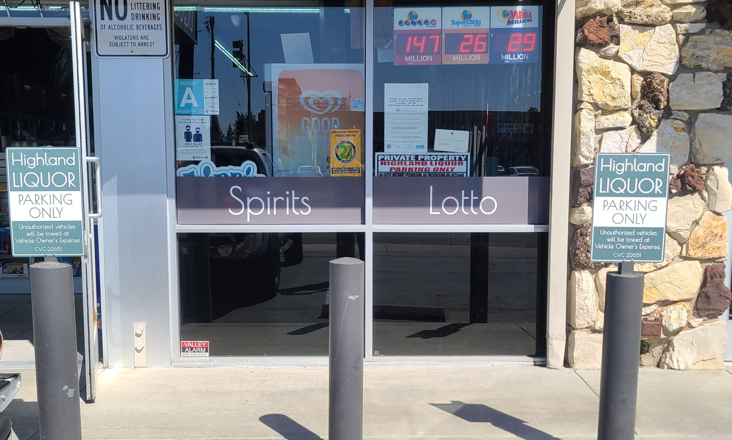 These aluminum signs for Highland Liquir's Granada Hills establishment frame the store's window signs advertising spirits and lotto - life's essentials!