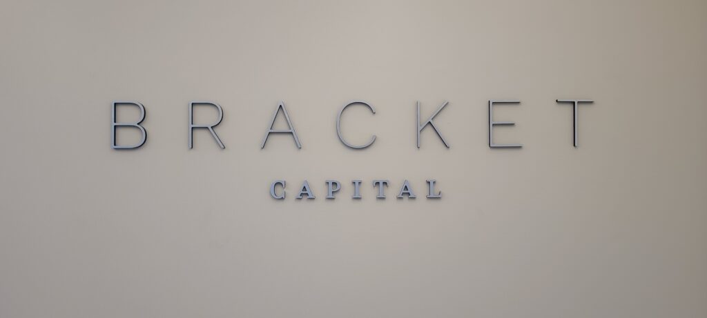 This acrylic lobby sign for Bracket Capital's Los Angeles location is sleek and stylish, it will impress their clients and enhance their office aesthetics.