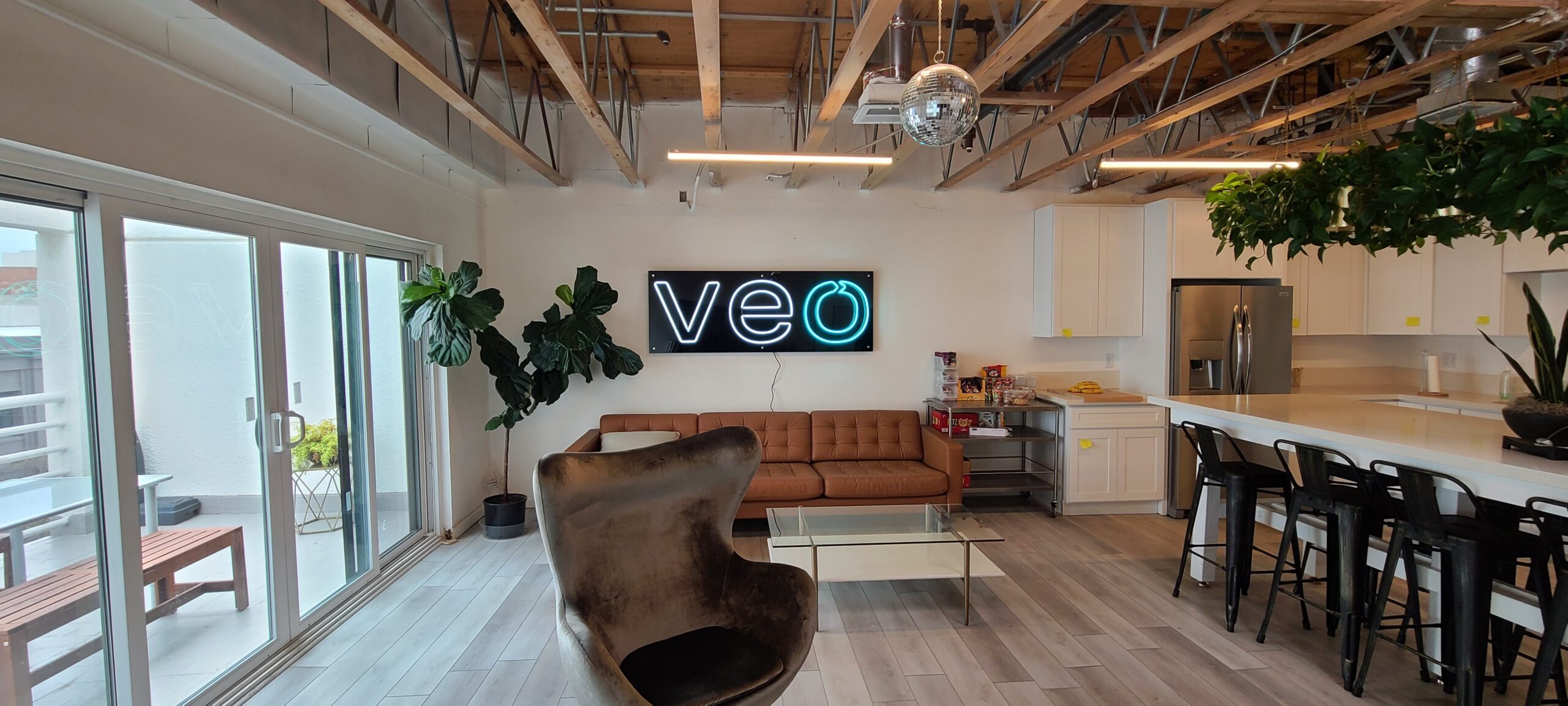 VEO's new neon lobby sign has for their Santa Monica office serves as an impressive centerpiece for their workplace. 