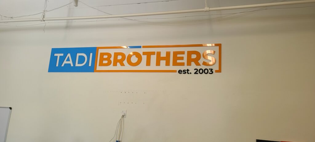 More from our sign package for Tadibrothers in Reseda. This acrylic lobby sign adorns their office, serving as a centerpiece.