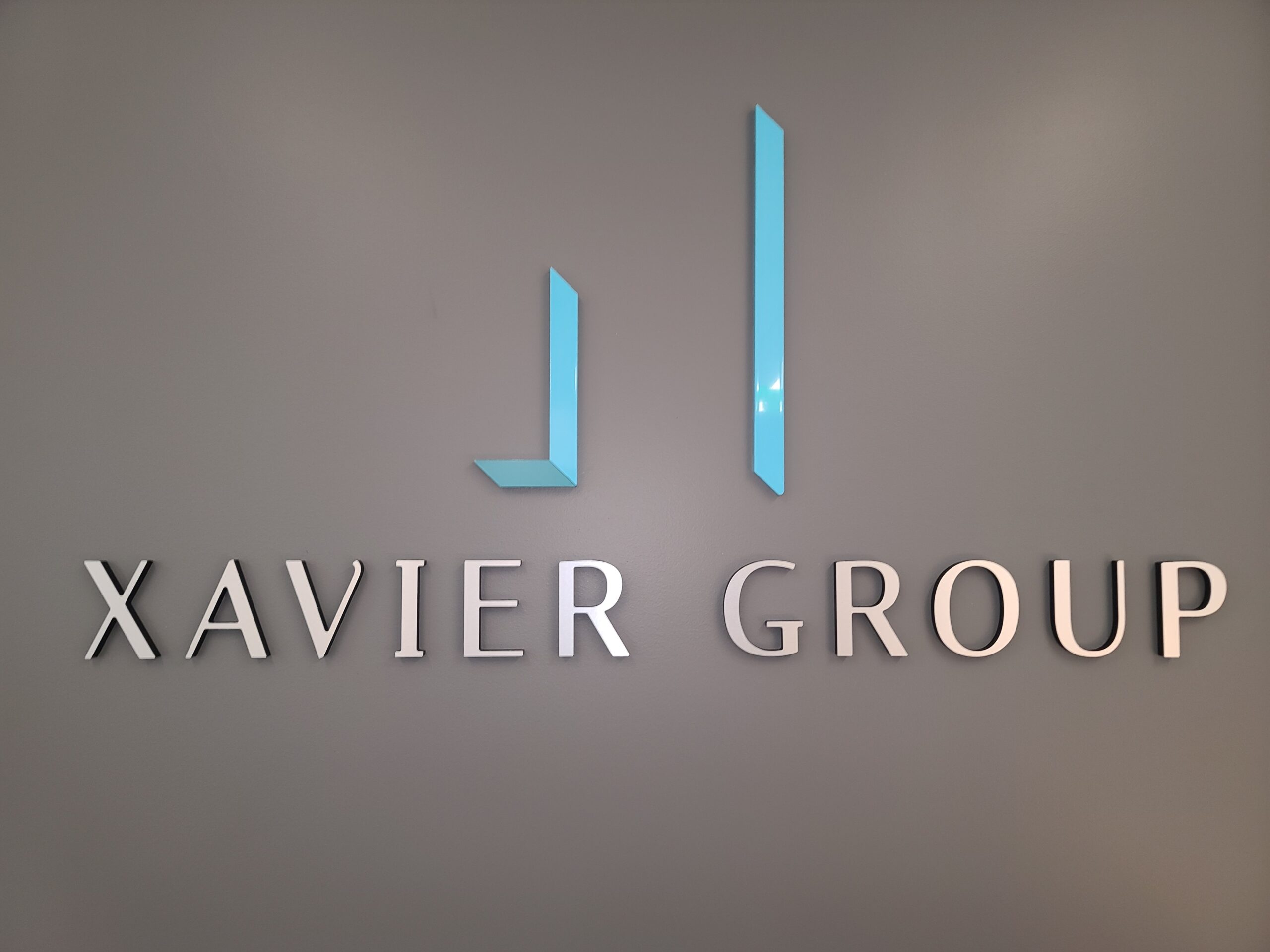 The Xavier Group deserves signage of the same caliber as their products and services, such as our black acrylic letters lobby sign for their Los Angeles office.