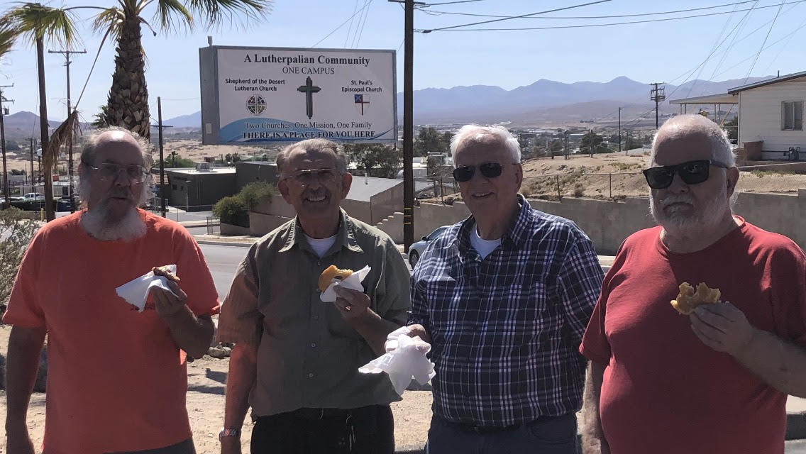 This is Desert Lutheran Church's new light box sign insert and at the foreground of the Barstow church sign are our happy clients with some delicious pastries.