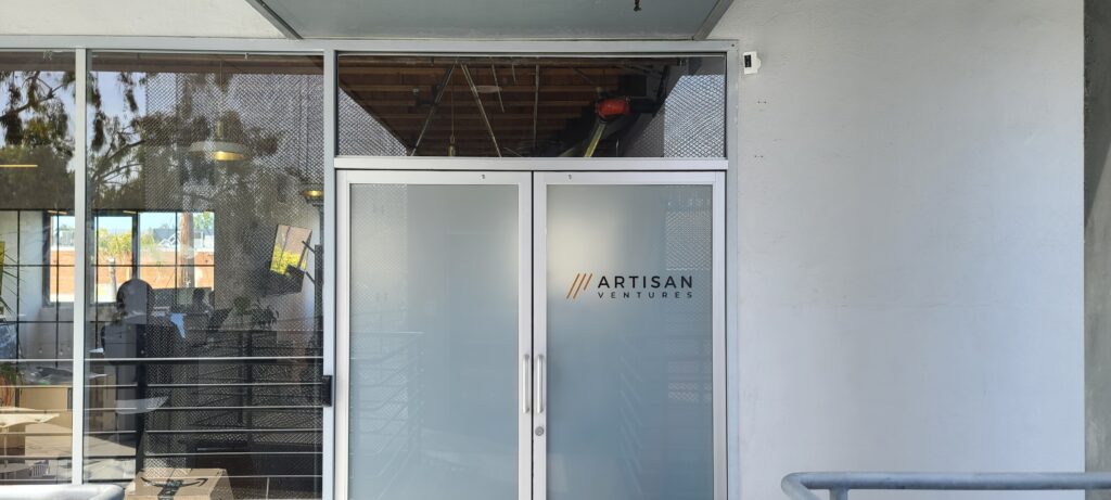 Part of our office sign package for Artisan Ventures in Santa Monica, these window graphics display their company logo at their entrance.