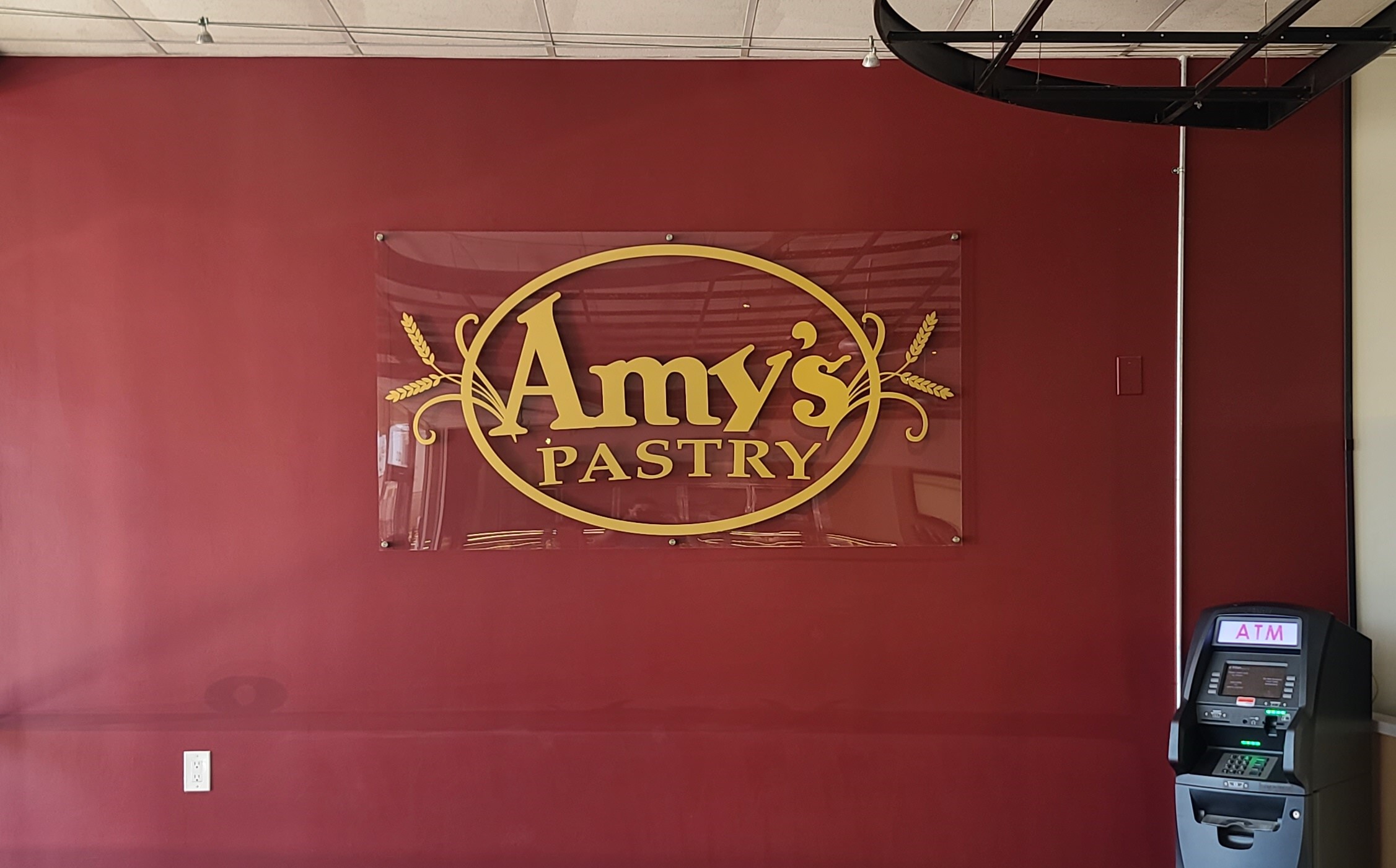 This beautiful panel sign for Amy's Pastry in Montebello completes their establishment and will impress customers as they enter the bakeshop.