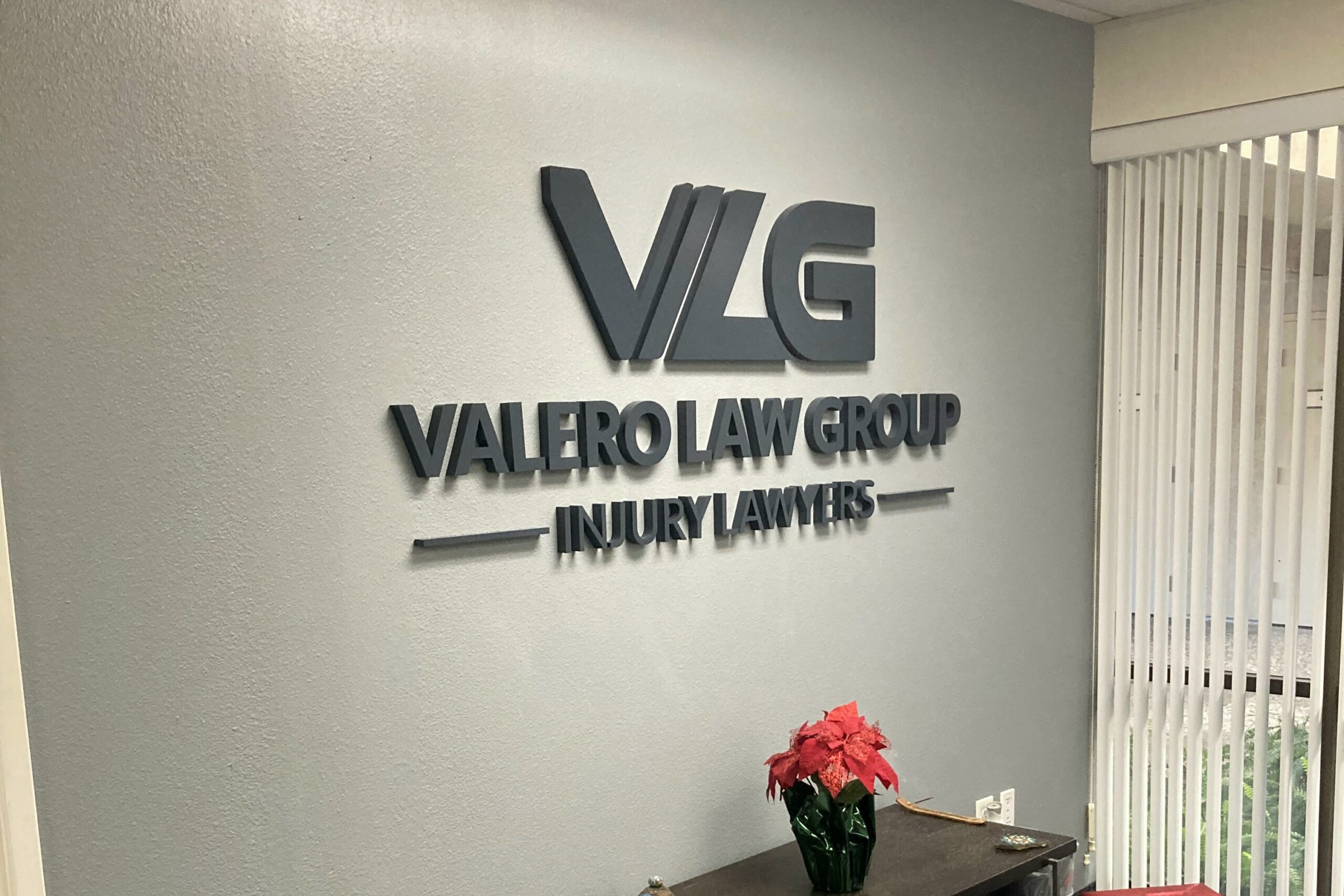 Multi-branch Valero Law Group lobby sign project