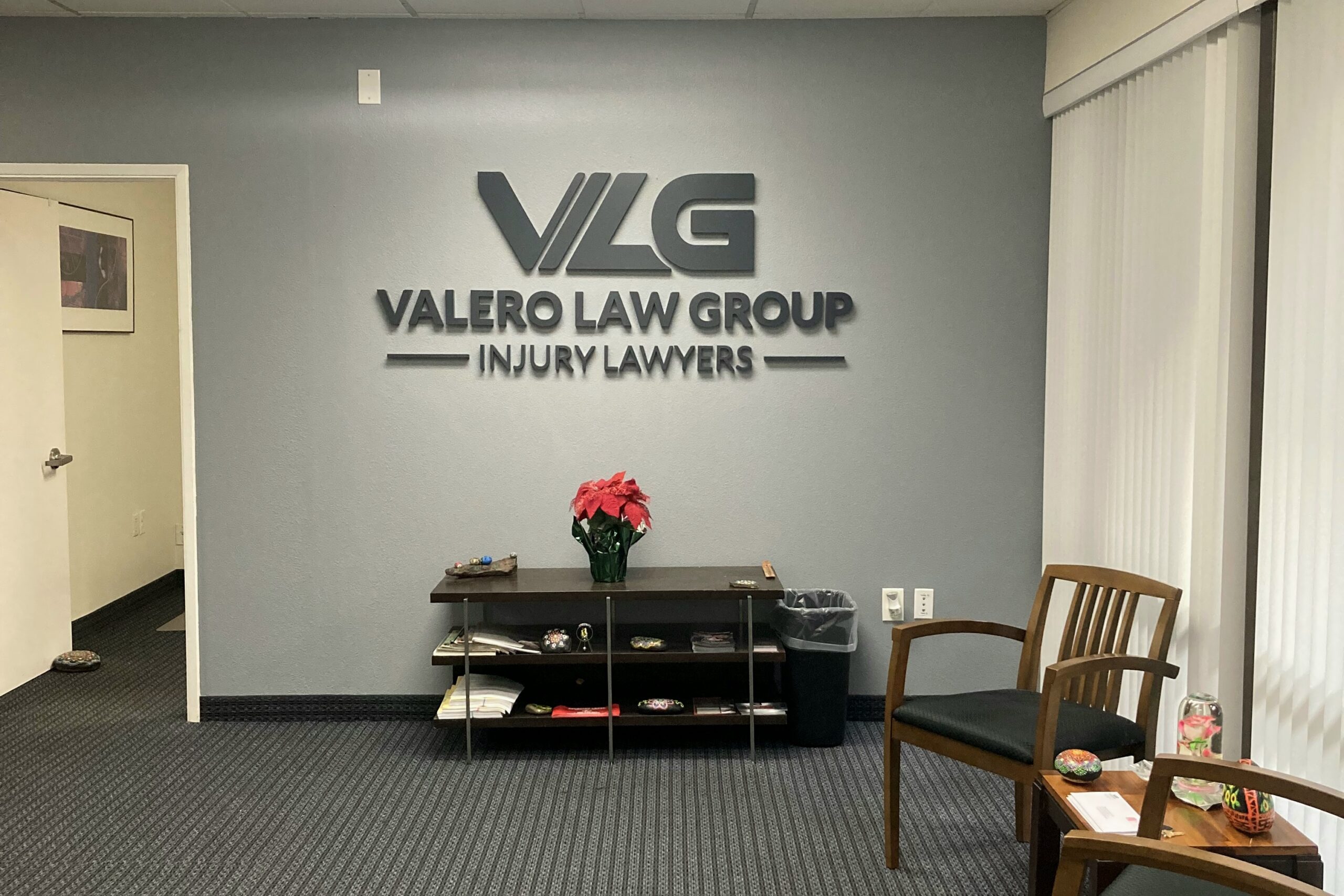 Reception desk sign for Valero Law Group
