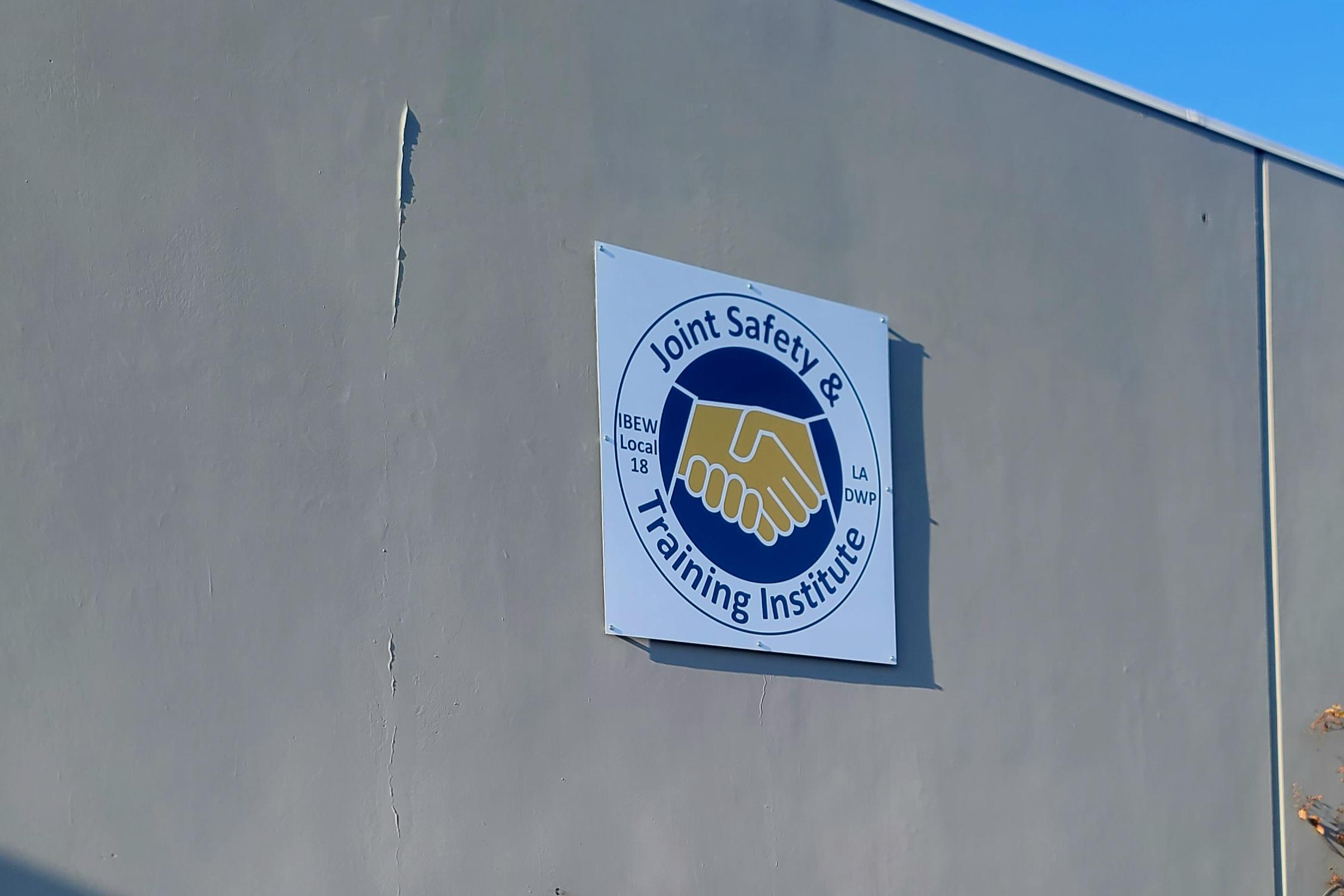 Sign Panel outside Joint Safety & Training Institute