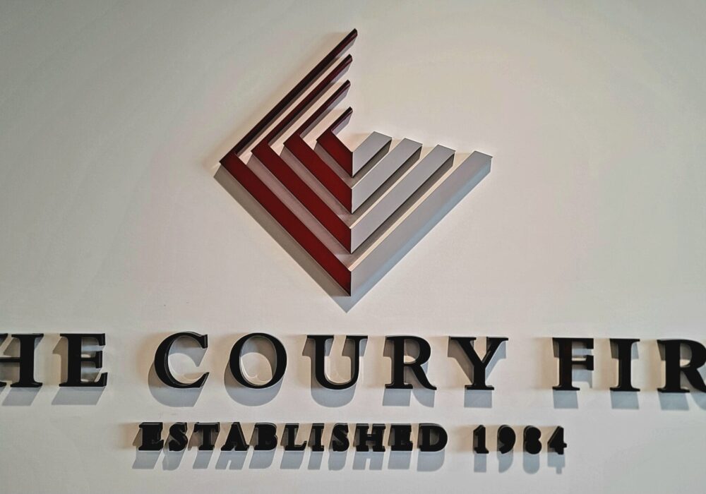 Coury Firm 2 Lobby Signs Los Angeles