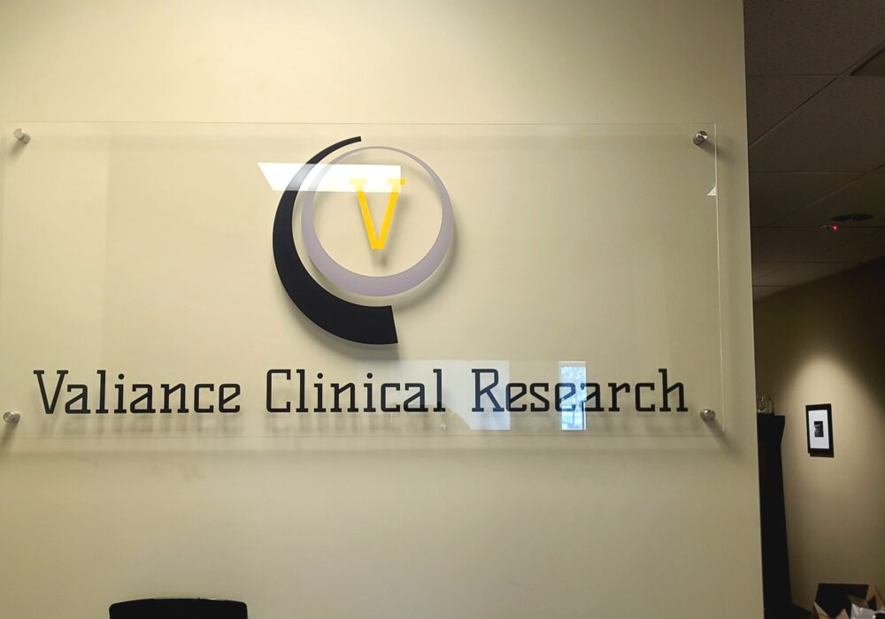 Valiance Clinical Research lobby signs for South Gate
