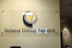 Read more about the article Valiance Clinical Research lobby signs for South Gate