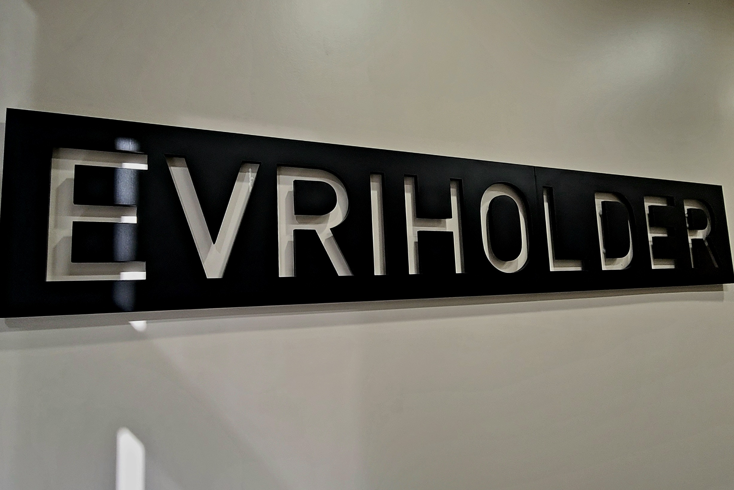 Modern 3D Lobby Sign: A sleek and modern sign for Evriholder