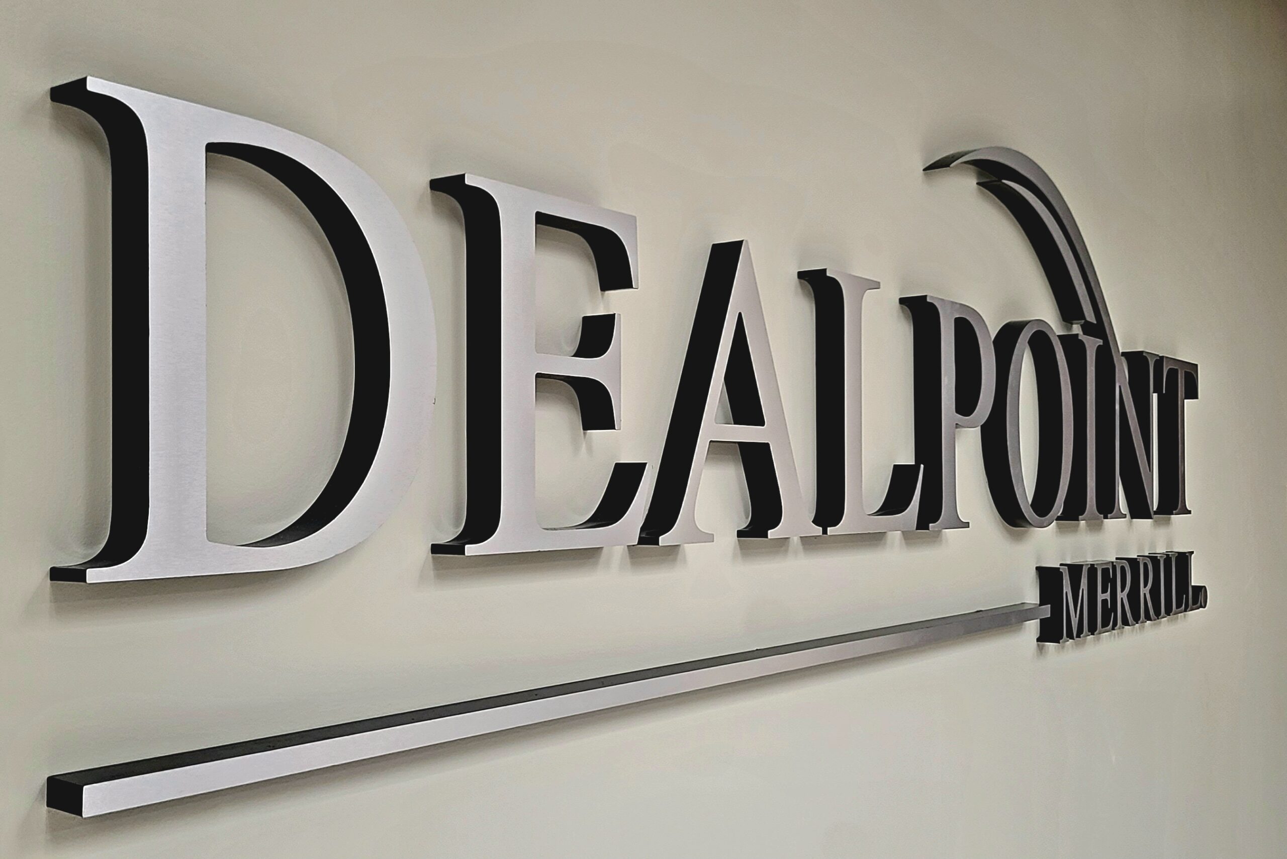 Dealpoint Merrill's lobby sign in the reception area