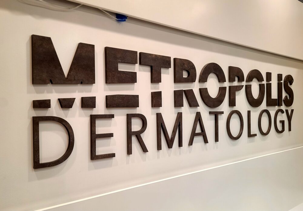 Metropolis Dermatology Lobby Sign Costa Mesa