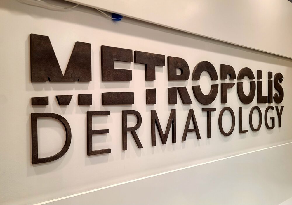 Metropolis Dermatology Lobby Sign Costa Mesa