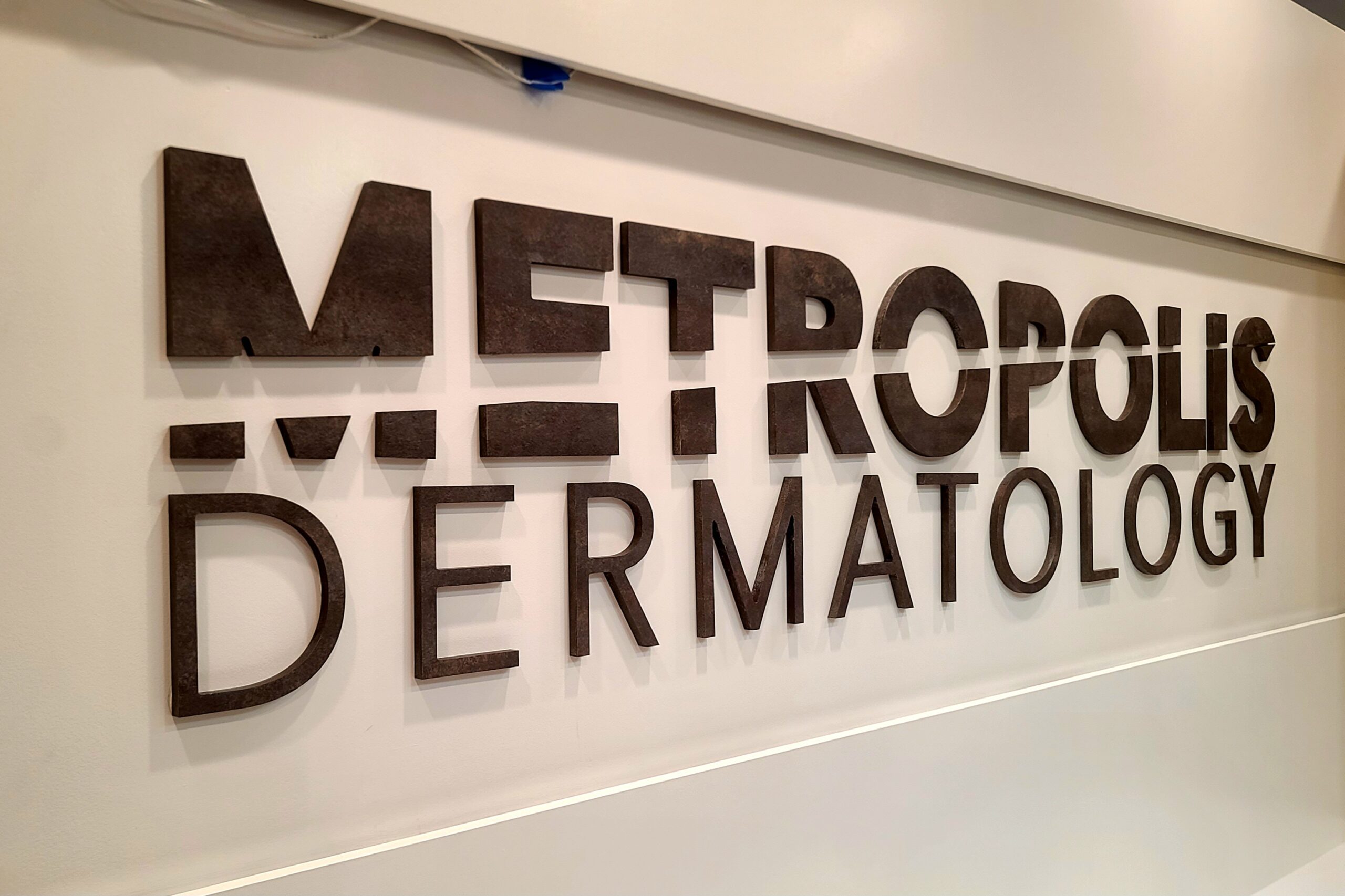You are currently viewing Metropolis Dermatology Lobby Sign Costa Mesa