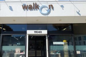 Customization Excellence: WalkOn Tile's logo and brand elements shining brightly through customized channel letters.