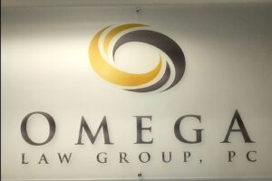 A lobby sign at Omega Law Group's office, showcasing professionalism and sophistication.