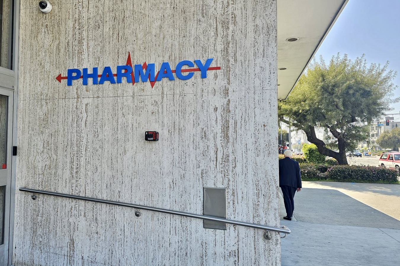 Exterior signage outside the MMC pharmacy building catching attention from customers