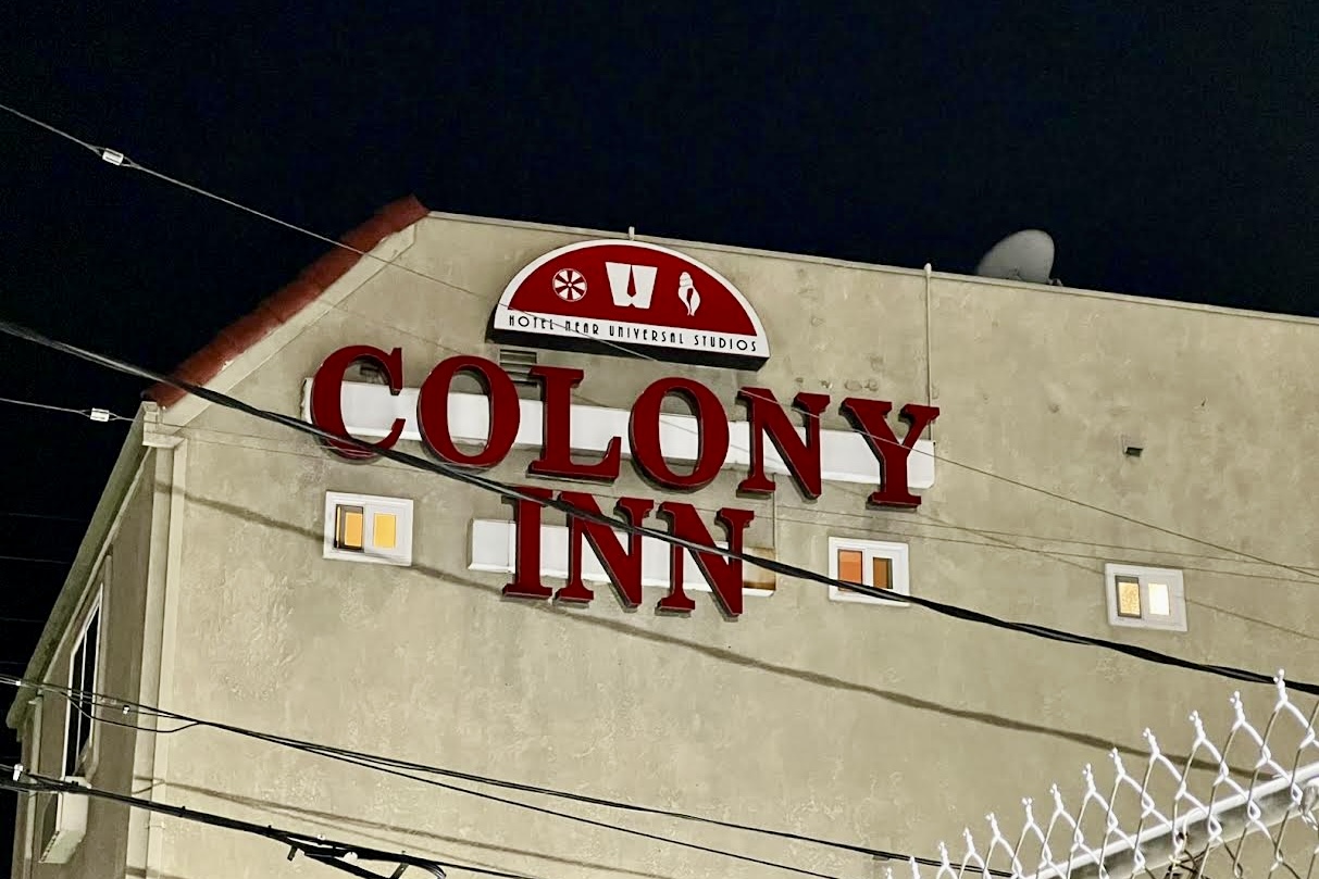 Bold red channel letters with white trim on the Colony Inn building in North Hollywood.