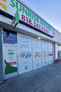 The pharmacy's storefront has door window graphics VG that showcase attractive product window perfs to grab the attention of potential customers.