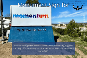 Monument sign for Momentum healthcare facility at entrance.