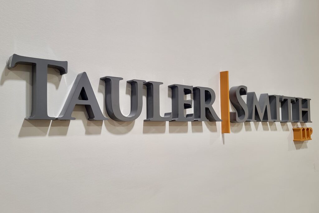 Lobby sign for Tauler Smith with dimensional letters by Los Angeles sign maker Premium Sign Solutions.