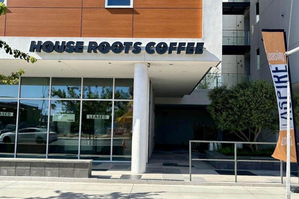 Close-up view of House Roots Coffee's upscale Northridge storefront, showcasing brilliantly illuminated channel letters that exude luxury and sophistication.