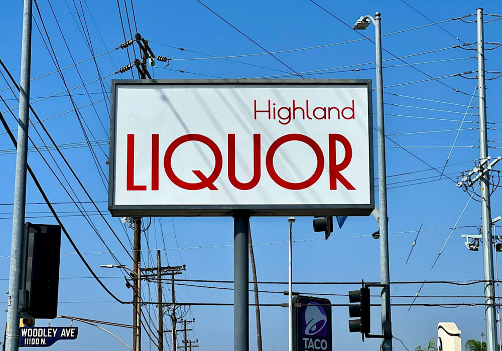 Highland Liquor Pole Sign with Red Faces