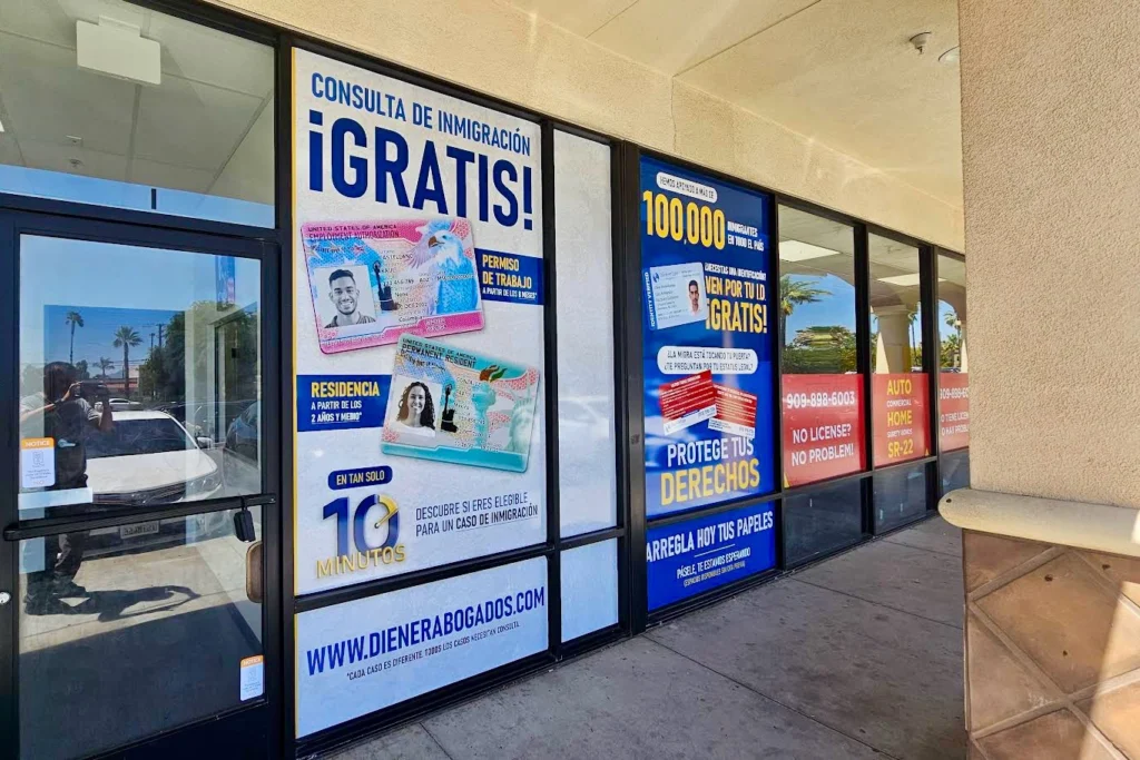 A  close-up view of one of Diener Law’s middle window graphics. The high-quality materials ensure a clear and vibrant display, featuring client testimonials and awards on the top section and contact information on the bottom.
