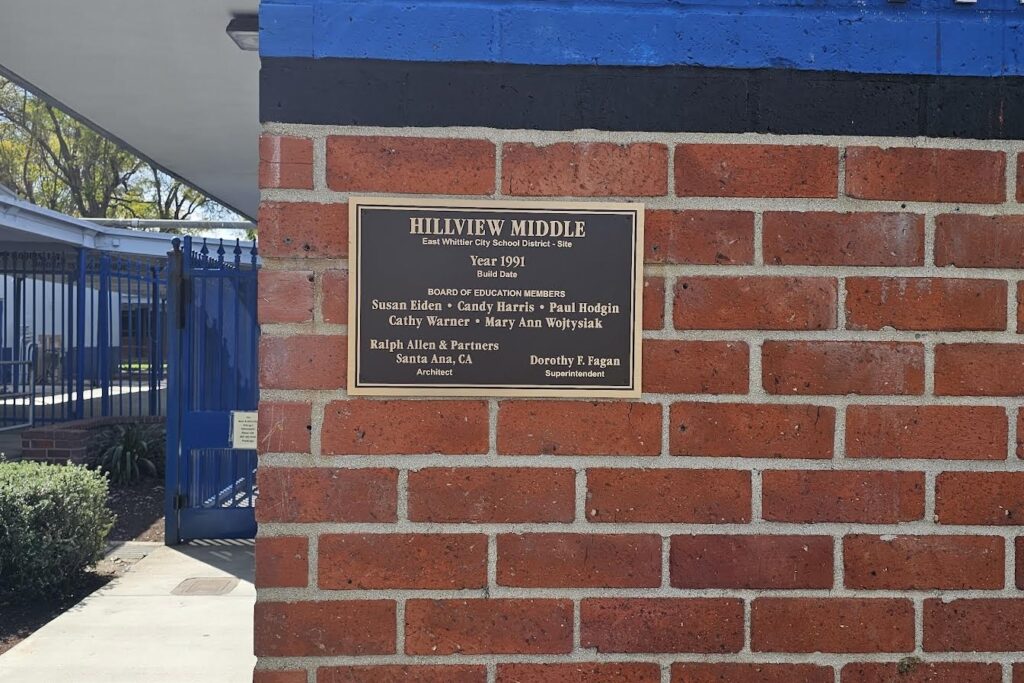 Bronze plaque showcasing school’s long-standing commitment to education