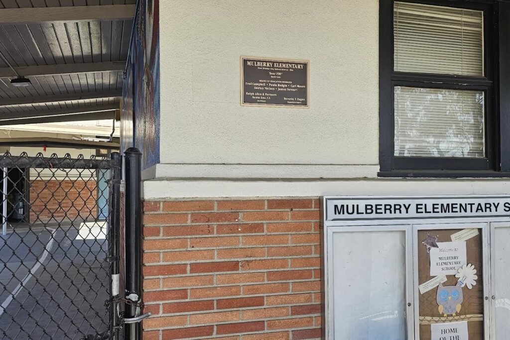 Group of bronze plaques before installation at East Whittier schools