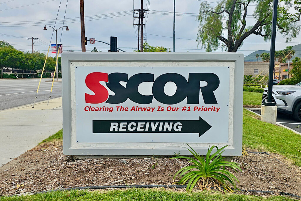 Exterior monument wayfinding signage with clean design installed at SSCOR Simi Valley facility entrance