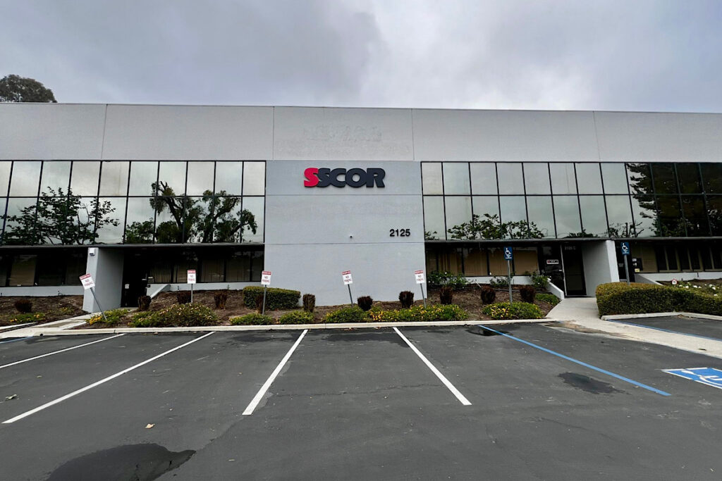 Wide view of SSCOR building wayfinding signage enhancing visibility for healthcare equipment buyers