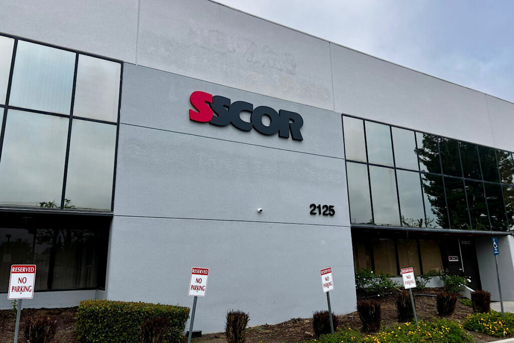 Dimensional wayfinding signage for business installed on SSCOR Simi Valley manufacturing facility