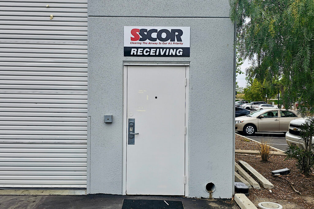 Wayfinding signage for business showcasing SSCOR’s building sign for receiving medical equipment headquarters