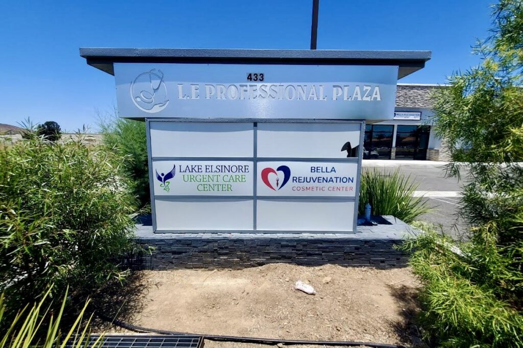 View of illuminated healthcare signage mounted on a monument sign in Lake Elsinore.