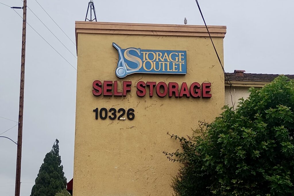 Exterior sign face replacements for multi-location businesses at Bellflower Storage Outlet