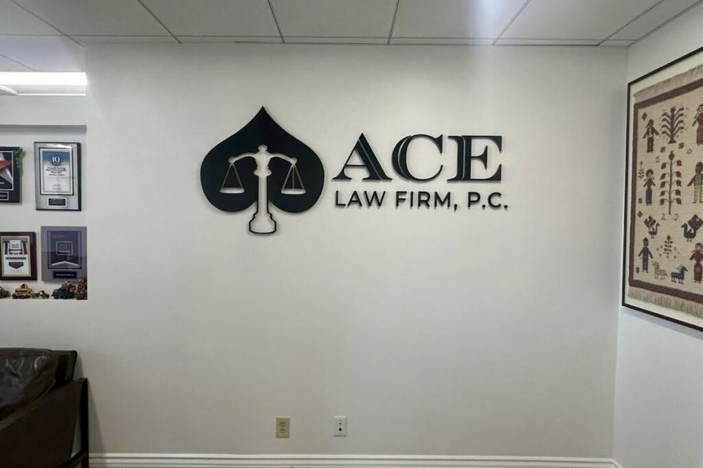 A full view of an acrylic signage for law firms in The Ace Law Firms office reception.