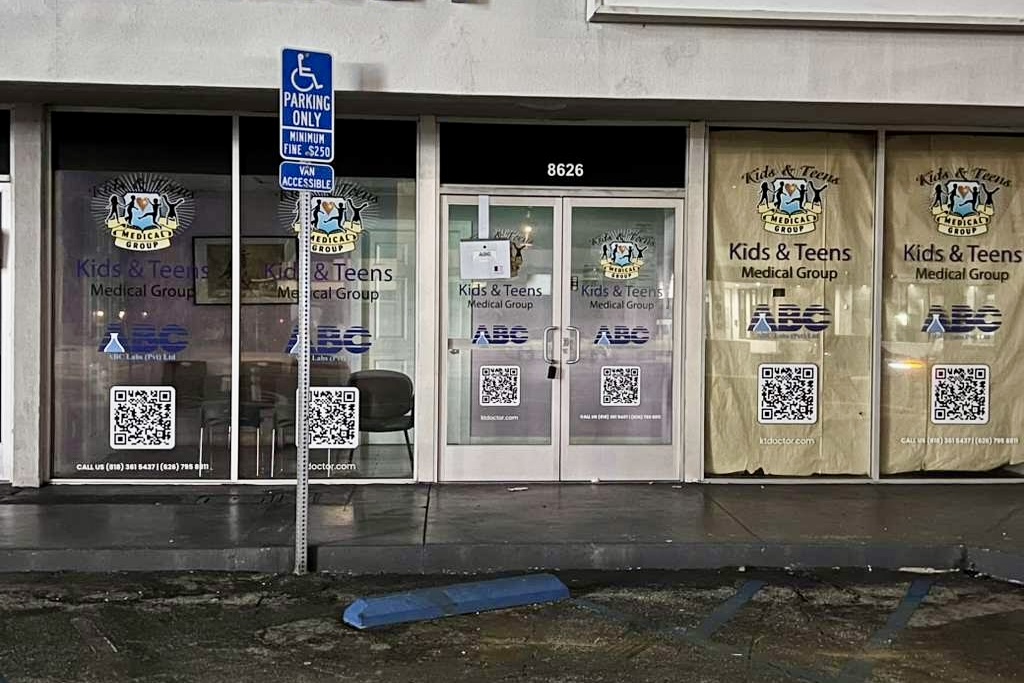 Colorful pediatric medical window graphics for Kids and Teens Medical Group Northridge storefront.