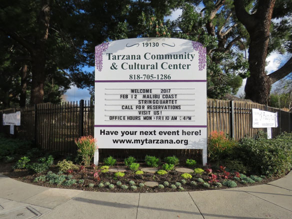 Tarzana Community Center monument sign with events and contact info.
